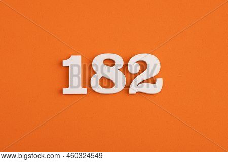White Wooden Number 182 On Eva Rubber Orange Background