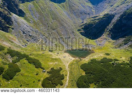 Aerial Drone Point Of View Of Iezer Lake, Rodnei Mountains, Eastern Carpathians, Romania