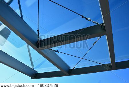 Strut, Suspended Glass Roof Above The Building Entrance. Bus Station, Railway Station. Cable Wind Br
