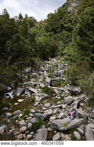 Waterfall And Rocks Of The Fafiao River, In The Gerês Natural Park (portugal)