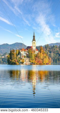 Gorgeous Sunny Day View Of Popular Tourist Destination  Bled Lake. Dramatic View Of Pilgrimage Churc