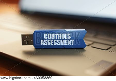 Computer And Security Concept. On The Laptop Keyboard Is A Flash Drive With The Inscription - Contro