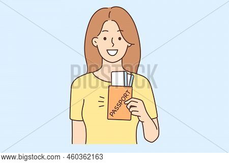 Smiling Young Woman With Passport Excited About Journey. Happy Female Traveler Or Tourist With Docum