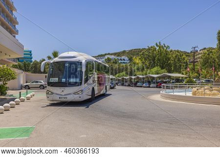 Close Up View Of Tourists Buss Near Hotel Building. Rhodes. Greece. 08.25.2022.