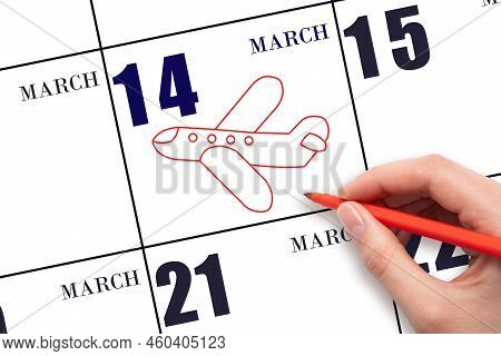 14th Day Of March. A Hand Drawing Outline Of Airplane On Calendar Date 14 March. The Date Of Flight 