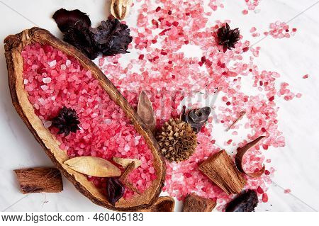Iodized Pink Bath Salt, Dried Plants And Herbs, Flowers, Coconut And Cacao In The Spa. Body And Heal
