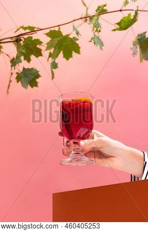 Glass With Delicious Aromatic Cocktail, Mulled Wine With Orange Slice And Cinnamon Stick Isolated Ov