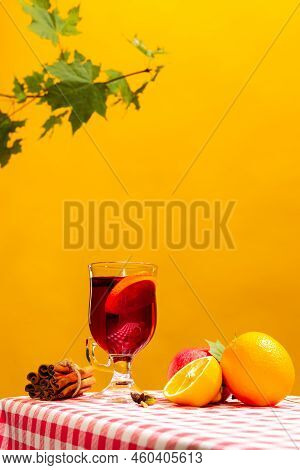 Glass With Delicious Aromatic Cocktail, Mulled Wine With Orange Slice And Cinnamon Stick Isolated Ov