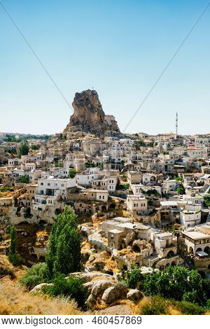 Cappadocia, Turkey - 20 July 2021. Day View Of Goreme Town With Blue Clear Sky On Horison. Famous Ce