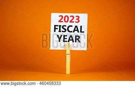 2023 Fiscal Year Symbol. White Paper With Words 2023 Fiscal Year, Clip On Wooden Clothespin. Beautif