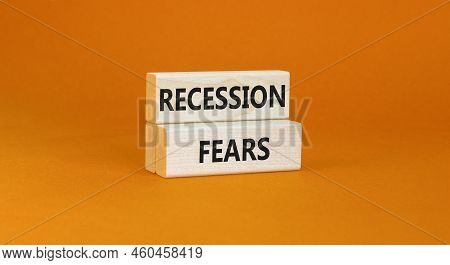 Recession Fears Symbol. Concept Words Recession Fears On Wooden Blocks On A Beautiful Orange Table O