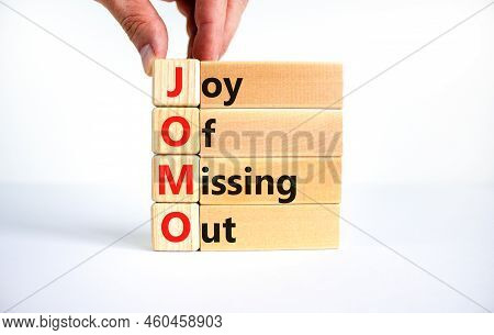 Jomo Joy Of Missing Out Symbol. Concept Words Jomo Joy Of Missing Out On Wooden Blocks On A Beautifu