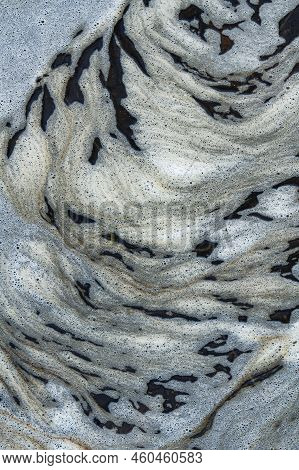 Foam Created By Moving Water Past And Below A Waterfall Settles In An Eddy And Creates This Abstract