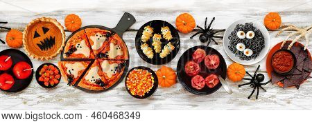 Fun Halloween Dinner Party Table Scene Over A White Wood Banner Background. Top View. Ghost Pizza, E