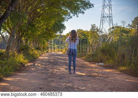 Persn Woman In The Stret In Nature