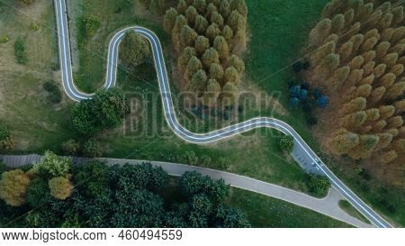 Winding Bike Path In The City Park. City Park At Dawn. Aerial Photography.