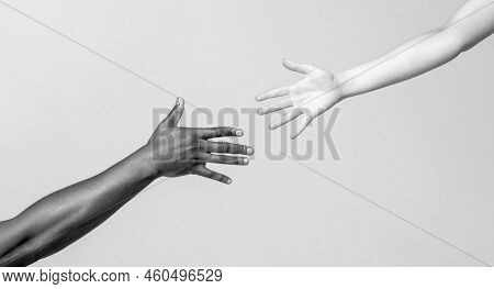 Helping Hand, Rescue, Multiathnic People. Helping Hands, Rescue Gesture. Giving A Helping Hand To An