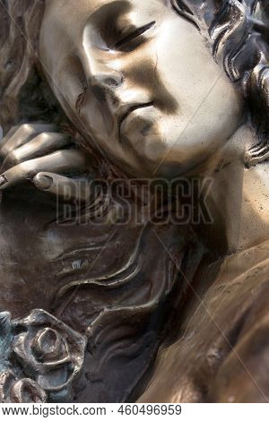 Vintage Sculpture Of Sad Woman In Grief. Virgin Mary Bronze Statue. Religion, Faith, Suffering, Deat
