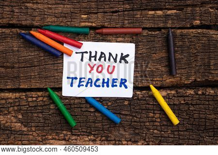 Thank You Teacher Note Isolated On Wooden Background With Color Pens, Happy Teachers Day Conceptual 