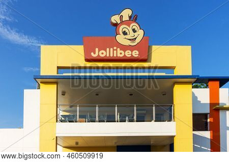 Manila, Philippines - July 05, 2019 - View Of Jollibee Sign At The Restaurant Near Manila Bay. Jolli