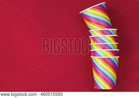 Rainbow-colored Paper Cups For Coffee, Ice Cream On A Pink Background. The Concept Of Gay Pride, Lgb