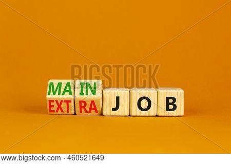 Extra Or Main Job Symbol. Turned Wooden Cubes And Changed Concept Words Extra Job To Main Job. Beaut