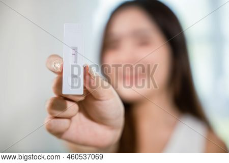 Close Up Woman Showing Rapid Antigen Test Kit For Selftest With Negative Result During Swab Covid-19