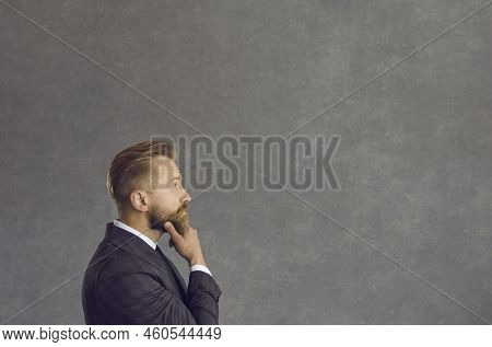 Thinking Puzzled Confused Uncertain Businessman Looking Forward At Copy Space