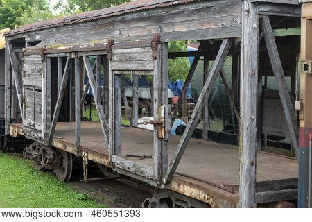 Photography Of Old Broken And Abandoned Wooden Tyren Wagon