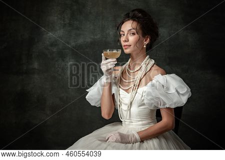 Portrait Of Young Charming Girl In Image Of Medieval Royal Person Or Viscountess Posing Isolated On 