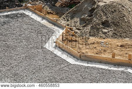 Concrete Foundation Of The House And Backfilling Of Rubble.
