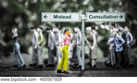 Street Sign The Direction Way To Consultation Versus Mislead