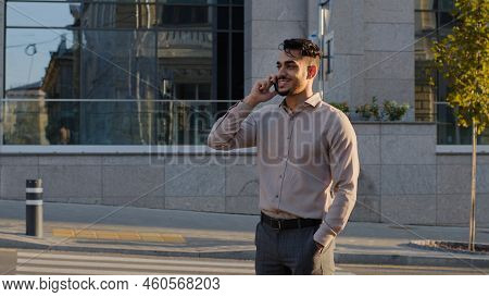 Young Happy Smiling Successful Business Man Bearded Guy Boss Leader Manager Stands In City On Street