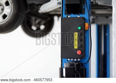 Car Service. Lifted Auto In The Garage. Diagnostics, Warranty Tecnical Maintenance, Repair. Car Insu
