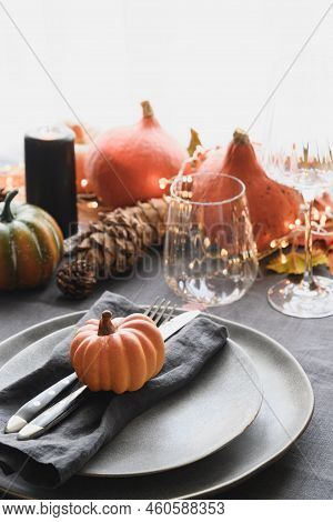Halloween And Thanksgiving Day Dinner Decorated Fallen Leaves, Pumpkins, Grey Plate.