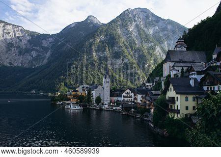 The Mountain Town Of Hallstatt Surrounded By Mountains. Hallstatt Old Town And Hallstatter See Lake 