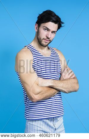 One Handsome Brunet Man In Striped Underware During Early Morning Posing With Hands Folded In Front 