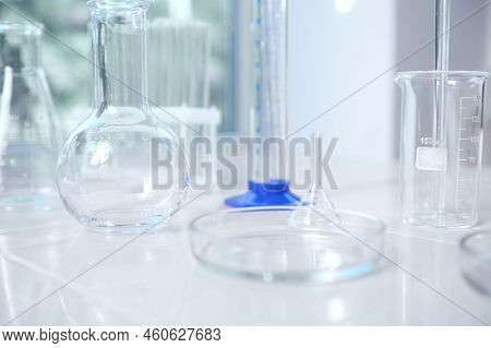 Close-up Of Empty Labware On A White Table Background In A Chemical Scientific Biological Laboratory