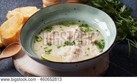 Avgolemono - Traditional Greek Chicken Soup With Rice, Lemon And Eggs