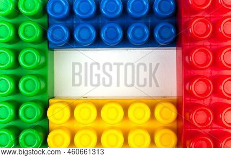 Educational Toy, Constructor For Children Isolated On White Background. Top View With Copy Space.