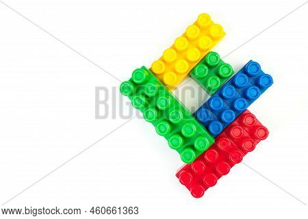 Educational Toy, Constructor For Children Isolated On White Background. Top View With Copy Space.