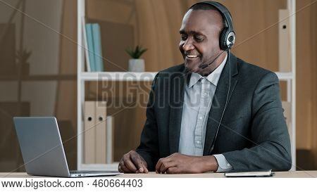 Elderly Cheerful Businessman African Agent Broker Salesman Old 50s Man Boss In Headset Has Virtual M