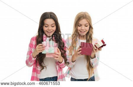 Intriguing Moment. Small Girls Open Holiday Present. Children Excited Cheerful Faces Hold Presents. 