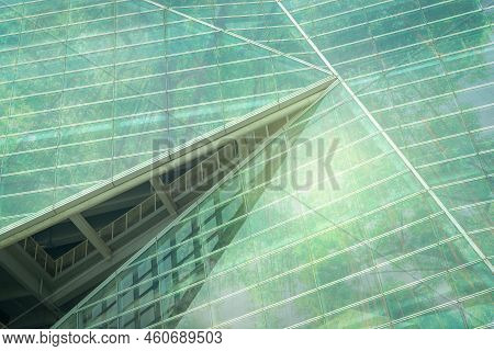 Sustainble Green Building. Eco-friendly Building. Sustainable Glass Office Building With Tree For Re
