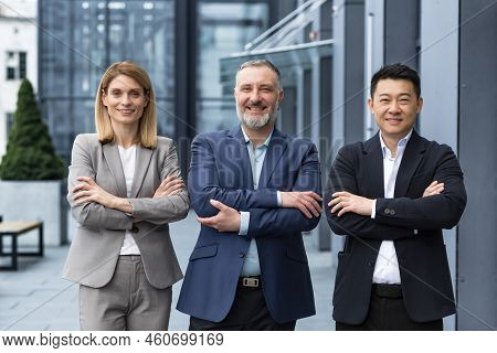 Successful Dream Team, Diverse Business Group Of Asian Man And Business Woman Smiling And Looking At