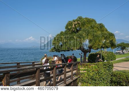 Stresa, Italy - August 15, 2018: Promenade In Stresa On Lake Maggiore. Stresa Is A Town In Piedmont 