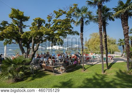 Stresa, Italy - August 15, 2018: Restaurant On The Lakeside Promenade Of Lake Maggiore In Stresa. St