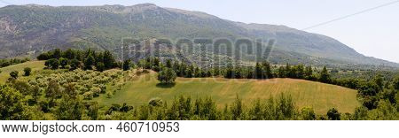 Rural Landscape With Fields And Mount Erymanthos In Greece