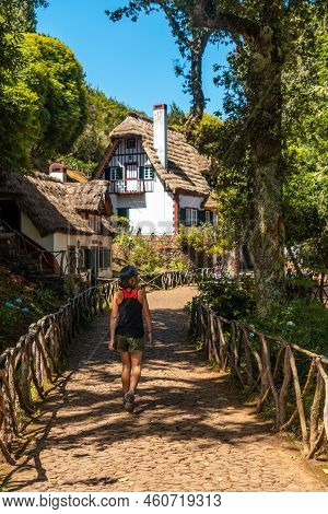A Young Woman Walking At The Start Of Levada Do Caldeirao Verde, Queimadas, Madeira. Portugal