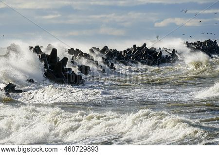 Big Waves Breaking Over Harbor Breakwall In The Baltic Sea